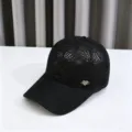 Detailed view of the black knit hollow crown flower baseball cap with rhinestone heart charm. - Adult Model, 54-59cm Adjustable / Black
