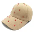 Close-up of beige waffle baseball cap featuring cute red strawberries and sparkling studs. - Strawberry Decoration / Adult Adjustable / Khaki