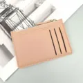 Minimalist PU leather card holder with zipper pocket and multiple slots for daily use. - Pink