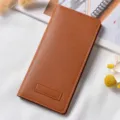Brown long women's wallet, bifold PU leather purse with minimalist design and card slots. - Tan