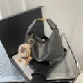 Black PU leather hobo bag with gold clasp handle and cute bear keychain charm for women. - With Pendant / Black