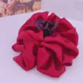 Red fabric bubble hair claw clip, fluffy cloud design for stylish back head styling and secure hold. - Burgundy