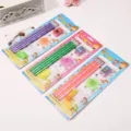 Detailaufnahme des Schüler Bleistift Schreibwarensets mit bunten Bleistiften und Zubehör. - 4-teiliges Bleistift-Set