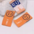 Colorful smile woven fabric labels DIY hair accessory decorative tags clothing labels patch - Orange