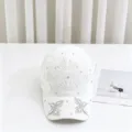 White knitted hollow baseball cap with rhinestone butterfly decoration for casual outdoor wear. - 54-59cm Adjustable / White