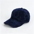 Detailed view of the dark blue corduroy baseball cap showing soft texture and curved brim design. - Adult, 56cm Adjustable / Navy Blue