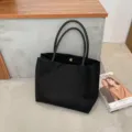 Sac cabas en toile noire, sac à main d'épaule minimaliste avec anses en cuir. - Noir