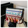 Ethnic style embroidered shoulder crossbody bag for women with vibrant tassels and strap. - Style 6 (ZT 0014)