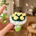 Detailed view of handmade crochet flower bouquet keychain with soft yarn and cute design. - Rose Bouquet (Green)