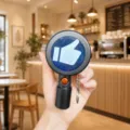 Electronic sound and light thumbs up keychain creative novelty pendant for daily use. - Black
