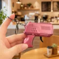 Mini metal flint gun keychain, creative decompression gear spark toy pendant for kids. - Flint Pistol (Red)