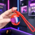 Miniature motorcycle helmet keychain with colorful visor and braided lanyard for bags. - Braided Lanyard Glowing Gradient Helmet / Red