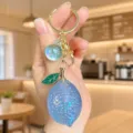 Cute blue lemon keychain acrylic jelly fruit bag charm pendant gift detail view - Acrylic Jelly Lemon (Blue)