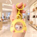 Cute Yellow Cat Face-Changing Keychain Stress Relief Cartoon Cute Bag Pendant Toy. - Vocal Face Changing Style / Yellow