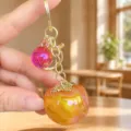 Creative persimmon keychain cute acrylic fruit bag pendant with nice golden hardware - Acrylic Good Things Happen (Orange)