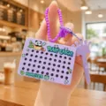 Cute panda magnetic steel bead drawing board keychain, mini educational decompression toy detail view. - Purple Panda
