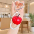 Cute simulated red apple keychain detail, resin fruit pendant with pearl bracelet and heart hook. - Red Apple