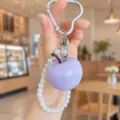 Cute purple resin apple keychain with pearl strap and heart metal clasp for bag and keys. - Purple Apple