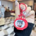 Cute Nezha 2 cartoon TV keychain detail shot, funny meme character pendant for school bag. - Flashing Light TV (Panicked)