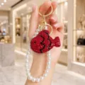 Exquisite rhinestone red fish keychain pendant with pearl chain strap for bags or phone. - Red