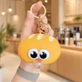 Cute bread squishy keychain with big eyes, stress relief toy backpack pendant for kids. - Bread Dessert Bubble Blowing