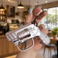 Mini flint gun keychain creative metal toy decompression tactical keychain for gifts - Flint Revolver (Champagne)