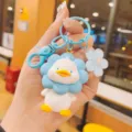 Cute cartoon resin sunflower duck keychain, lovely bag pendant and car key chain for women. - Blue Flower Duck