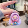 Cute cartoon face changing keychain purple bag pendant decompression toy accessory item - Purple