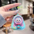 Cute cartoon face-changing doll keychain toy, portable backpack pendant for keys and bags. - Green