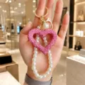 Pink rhinestone heart keychain with pearl beaded strap, elegant stylish bag charm accessory. - Pink