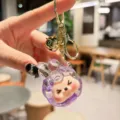 Cute liquid quicksand acrylic keychain with cute cartoon character design, metal bell and clasp. - Glitter My Melody (Purple)