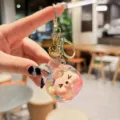 Cute liquid quicksand acrylic keychain with cartoon character design, perfect bag charm pendant. - Glitter My Melody (Multicolor)