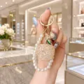 Sparkling crystal 3D apple pearl keychain luxury rhinestone bag charm for daily use - Champagne