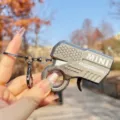 Mini metal gun keychain novelty decompression toy spark flint keyring pendant gift for kids - Metallic Flint Gun (Gunmetal)