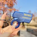 Mini flint gun keychain decompression toy, creative metal spark pendant for gifts. - Metallic Flint Gun (Royal Blue)