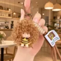 Flauschiger Lockenpuppe Schlüsselanhänger, süßer Cartoon Plüsch Taschenanhänger mit Gurt. - Braunes Haar Afro Mädchen