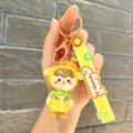 Cute cartoon cherry girl keychain, electroplated doll pendant for bags and keys. - Electroplated Girl - Yellow