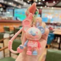 Close-up detail of colorful dopamine clown bear keychain pendant with glossy finish and metal ring. - Dopamine Clown Bear - Pink