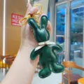 Green PU leather rabbit keychain with white bow, cute bag pendant and car keyring accessory. - Dark Green