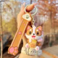 Close-up detail of the cute Corgi boba tea silicone keychain with lovely paw print strap. - Brown Milk Tea Corgi