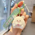 Cute resin mouse keychain detail view, bubble tea charm pendant for bags and keys. - White