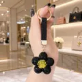 Rhinestone sunflower keychain black crystal daisy bag charm luxury gold hardware detail - Black Rhinestone Flower