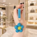 Blue rhinestone flower keychain sparkly crystal daisy bag charm luxury gold tone hardware - Lake Blue Rhinestone Flower