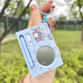 Cute electronic drum set keychain toy with recording function, mini stylus, and blue design. - Electronic Drum Set / Blue Duck