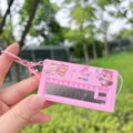 Mini electronic piano keychain, cute music toy, stress relief bag charm and gift. - Pink Squirrel