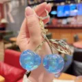 Sweet blue glitter cherry keychain, resin car bag pendant, exquisite sparkling charm for girls. - Glitter Blue Cherry