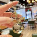 Portachiavi mela dorata ciondolo in metallo per borsa anello chiave auto elegante accessorio - Oro