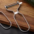 Stainless steel kitchen peeler multi-functional fruit and vegetable slicing tool for home. - Serrated Peeler
