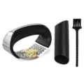 Stainless steel curved garlic press set with silicone peeler tube and cleaning brush. - Garlic Press 3-Piece Set (Boxed)
