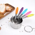 Stainless steel measuring cups set 5 pieces with colorful silicone handles for kitchen baking. - Five-Piece Set